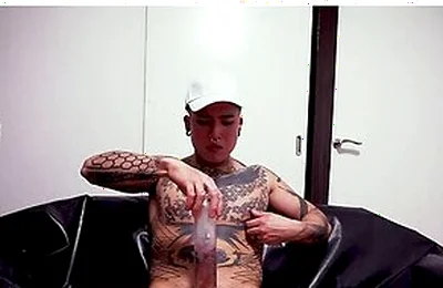 Horny Inked Yoshi Kawasaki Satisfies Dick With Sex Toy