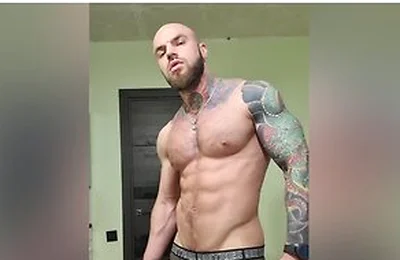 Bald Tattooed Jock Flex Muscles And Jerking