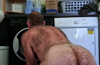 Hairy Bear Doing Laundry