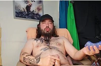 Braided Shirtless Tattooed Dude Edging